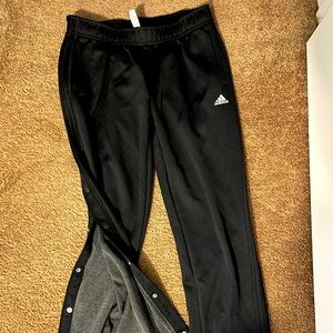 athletic pants with buttons down each side , flared pants leg, size 12-14